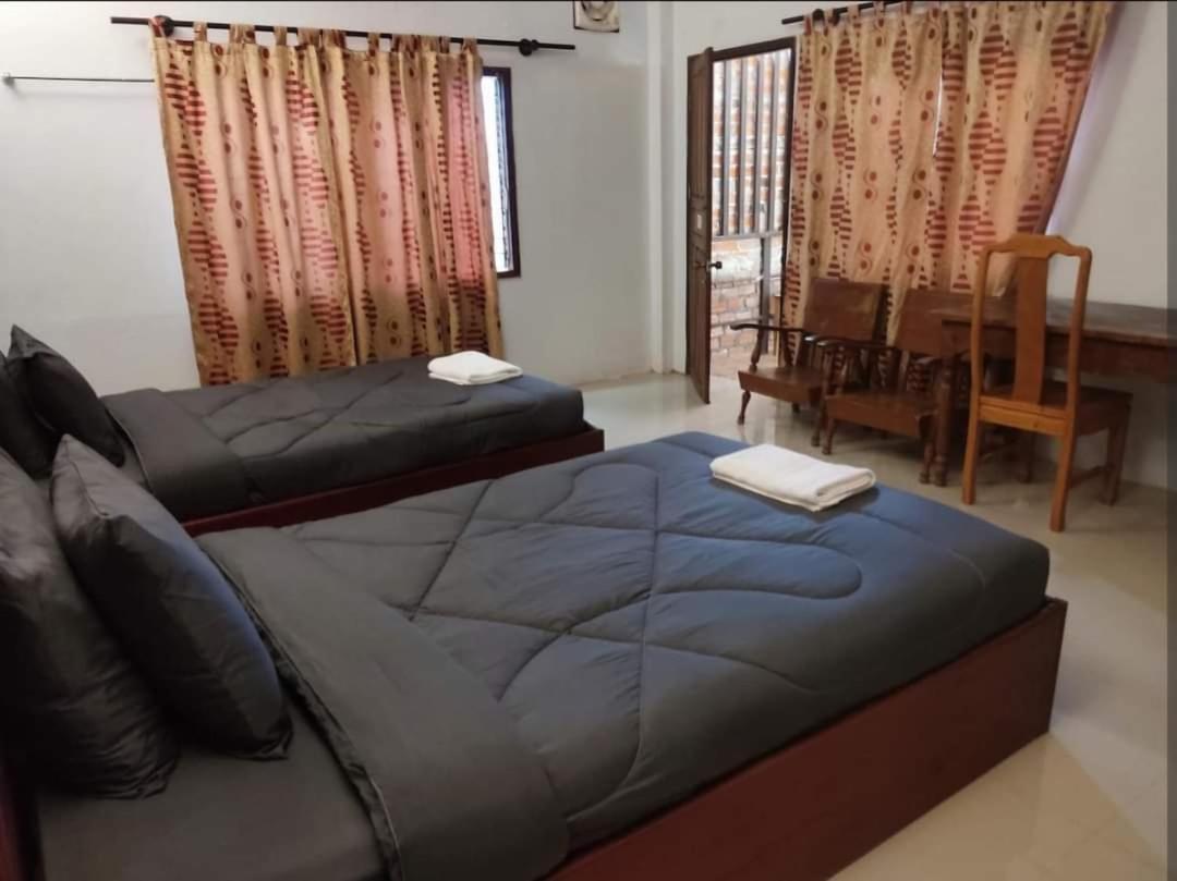 Erawan Guesthouse Pakse Extérieur photo